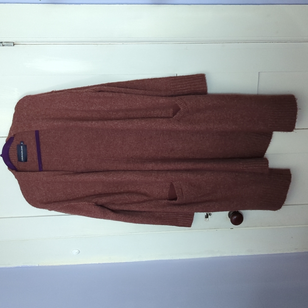 Dark red long sleeve 2 pocket open front cardigan. Like new.